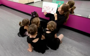 Woman reading to children